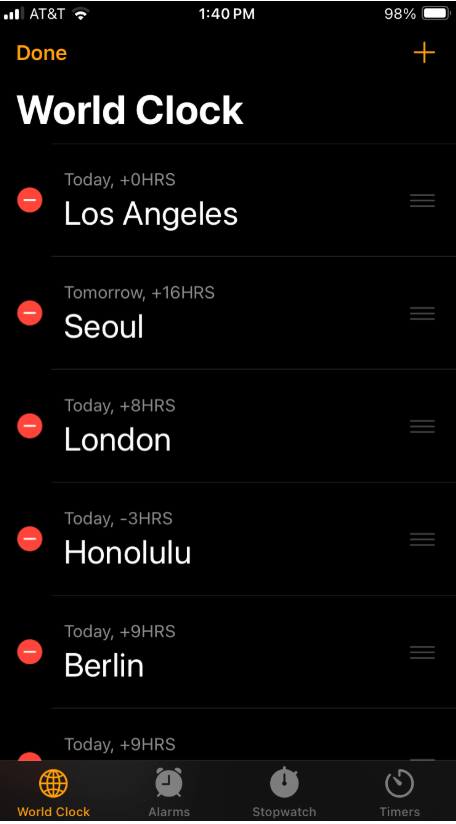 The 13 visual principles of design (with examples) 3 World Clock app in edit mode showing a list of cities with a bold red circular delete button next to each city name. The red colour creates strong contrast against the black background, signalling caution and emphasising the action’s importance.