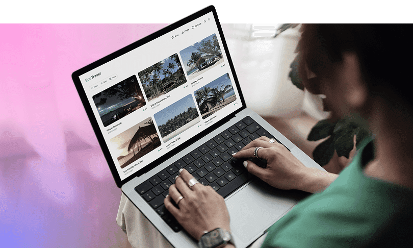 A person using a booking website on a laptop.